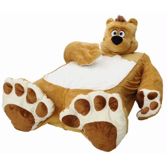 big teddy bear on bed