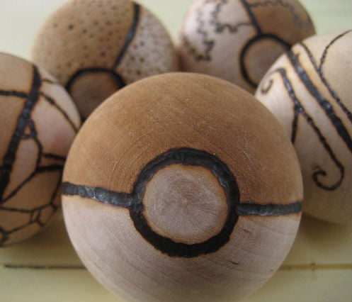 custom wood burned pokeballs