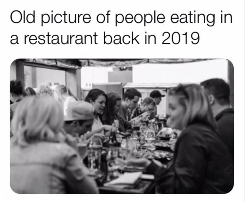 old picture of people eating at a restaurant back in 2019